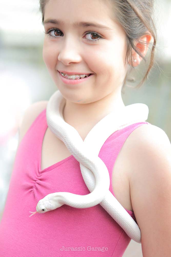 Lucy snake around girl's neck for portrait 